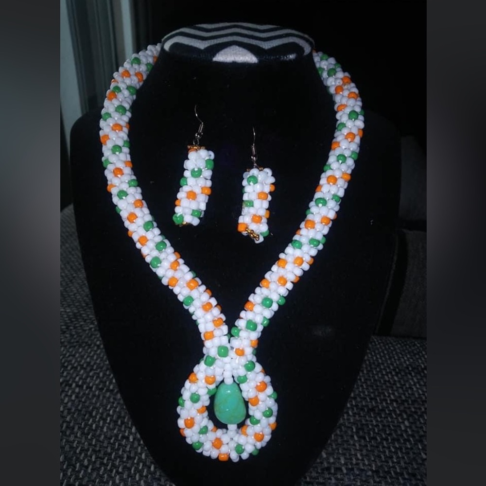 JJ’s unique handmade white dotted orange /nature green pendant crochet jewelry.